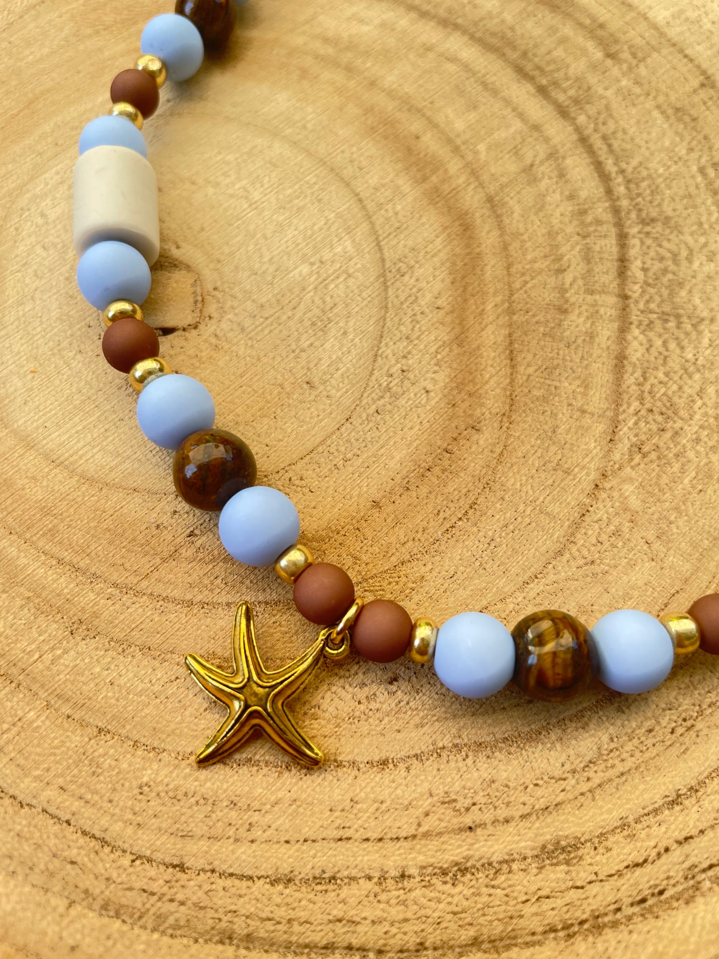 EM- Keramik- Halsband in hellblau/braun/gold