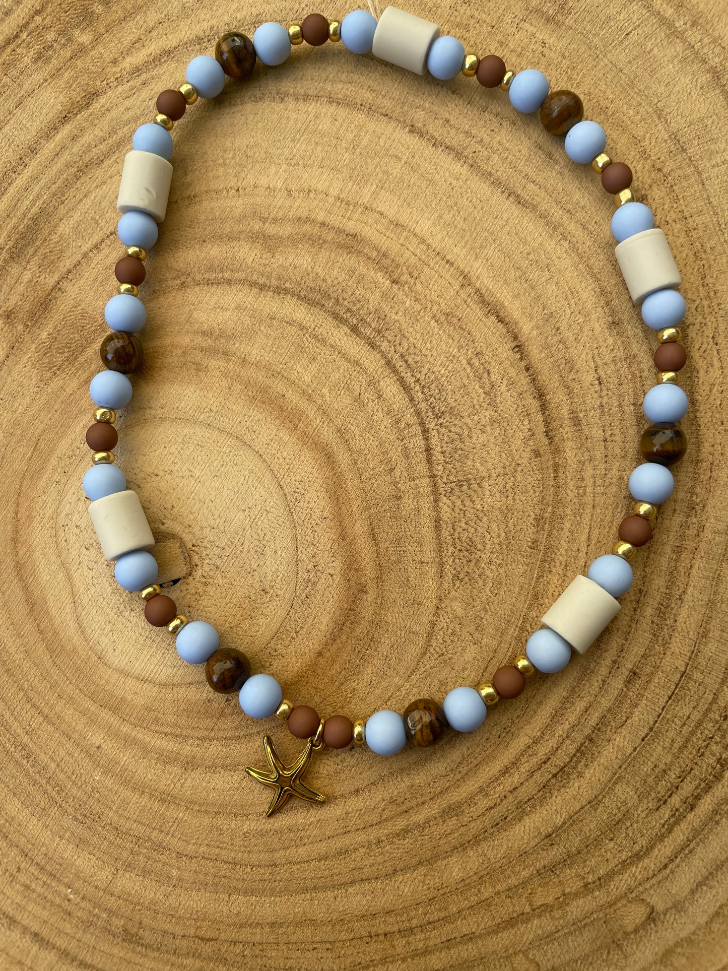 EM- Keramik- Halsband in hellblau/braun/gold